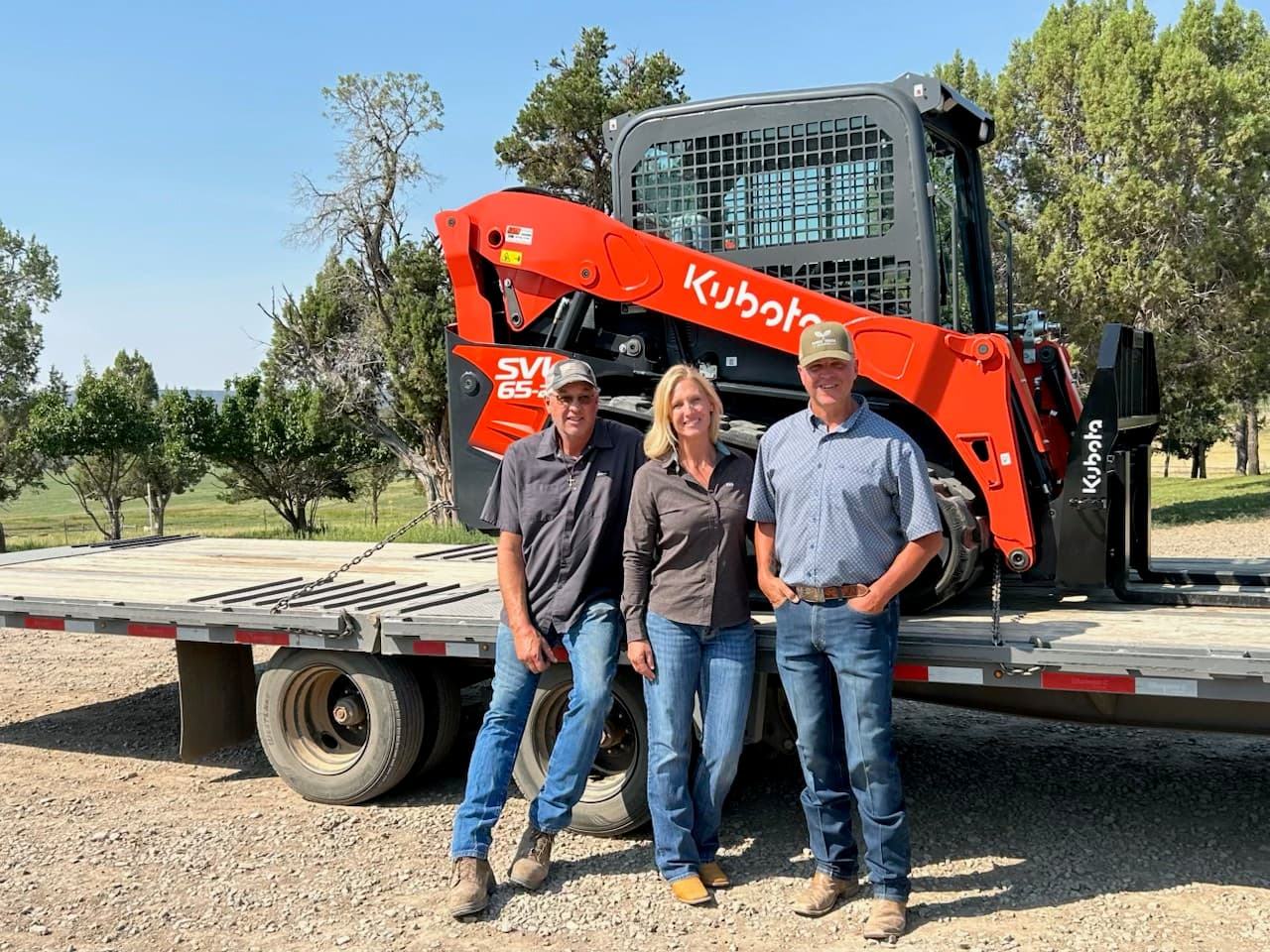 Local veteran and rancher Donald Woodmansee of Ignacio, CO receives the keys to his new Kubota SVL65-2 skid steer through Kubota’s Geared to Give program, with support from Southwest Ag, Inc., the Bayfield, CO-based Kubota dealer. (Pictured from left Rich Hillyer of Southwest Ag, Inc., Jen Woodmansee, and Donald Woodmansee)